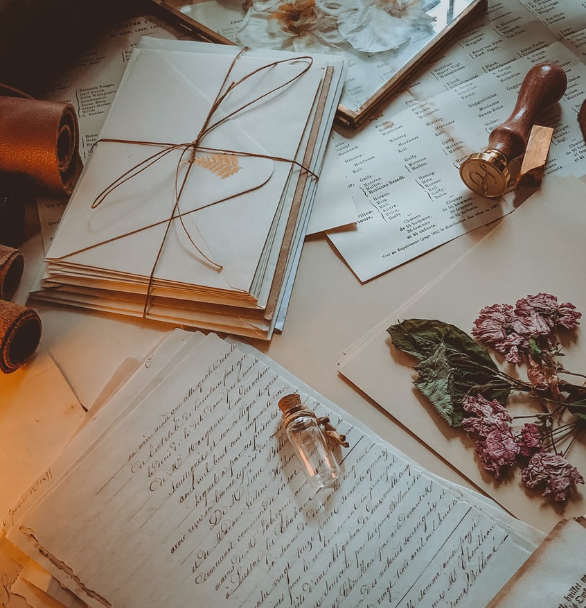 Letters and Envelopes on a Desk